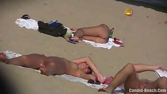 Uninhibited Couples Bare It All In Candid Nudist Beach Footage