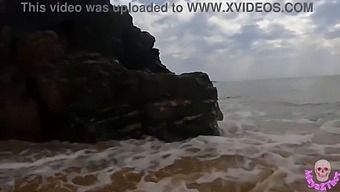 Couple Gets Frisky On A Crowded Beach In This Steamy Video